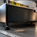 Pieds de meubles de salle de bain réglables : stabilisation du meuble vasque